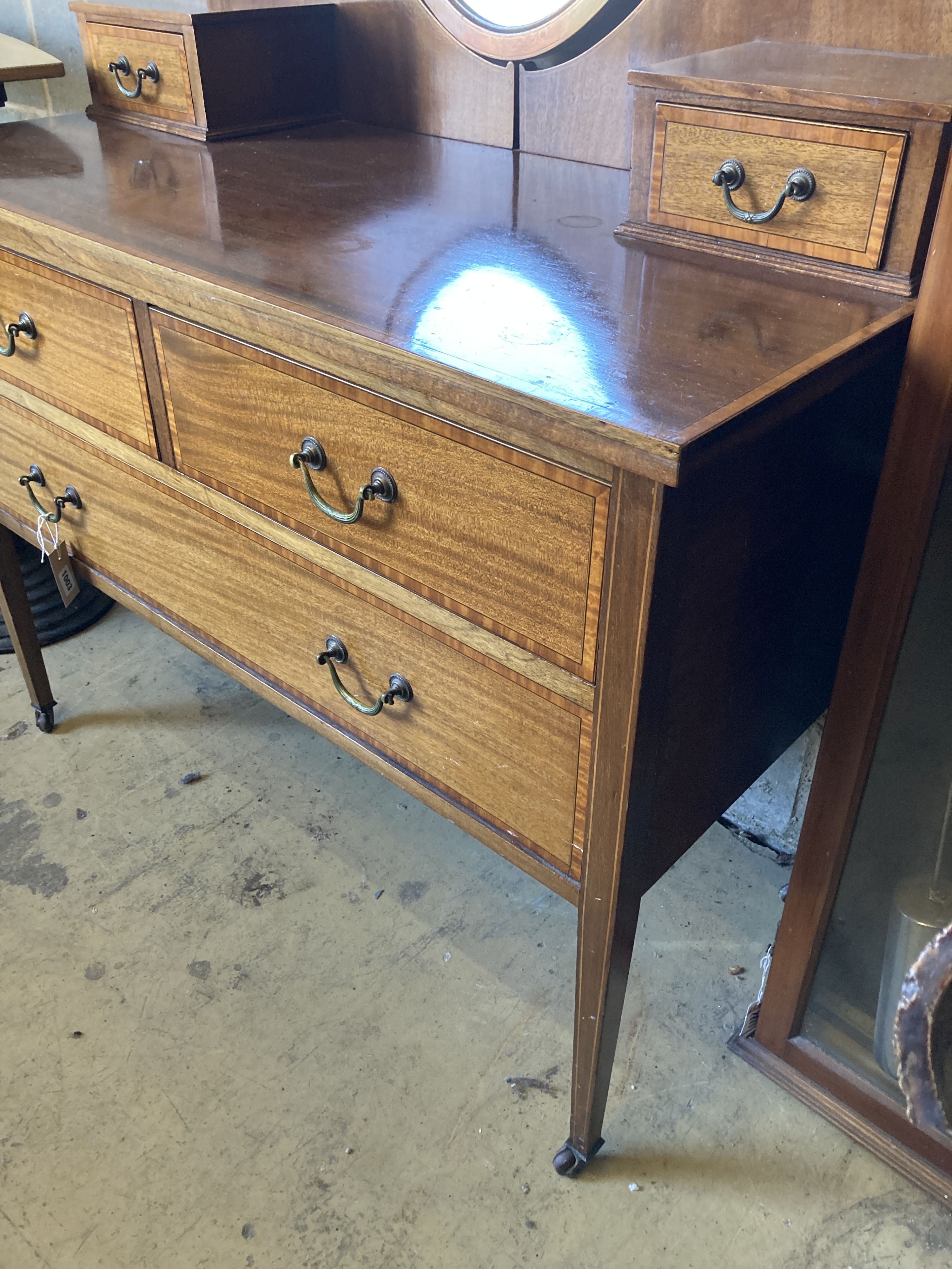 An Edwardian satinwood banded mahogany dressing table, width 107cm, depth 52cm, height 190cm